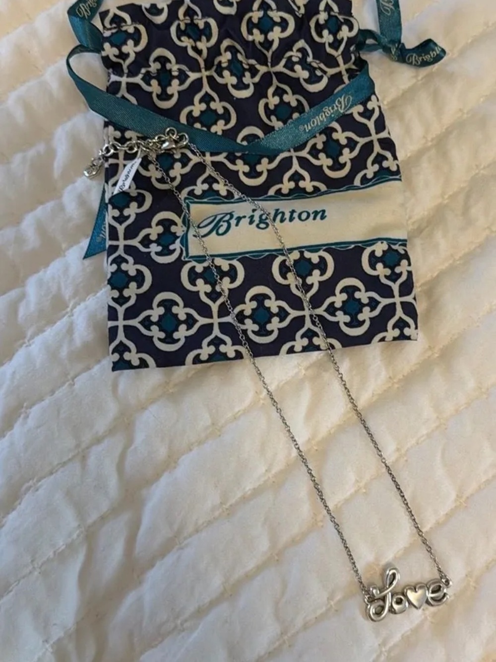 Brighton Silver 'Love' Script Necklace with Navy & Teal Pouch